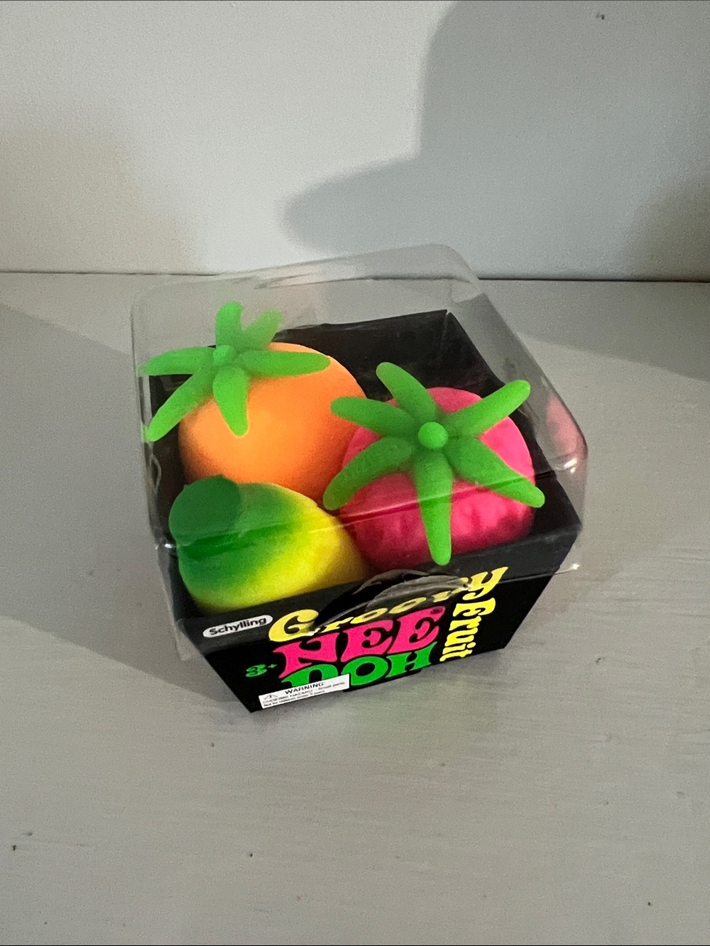 Nee doh Squishy Neon Fruit Toy Set - Bright Orange, Pink & Yellow-Green